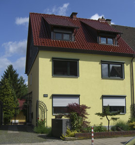 Dachsanierung mit glasierten Tonziegeln